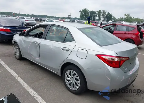 2018 Toyota Corolla Le from USA, damaged, VIN 5YFBURHE5JP759302
